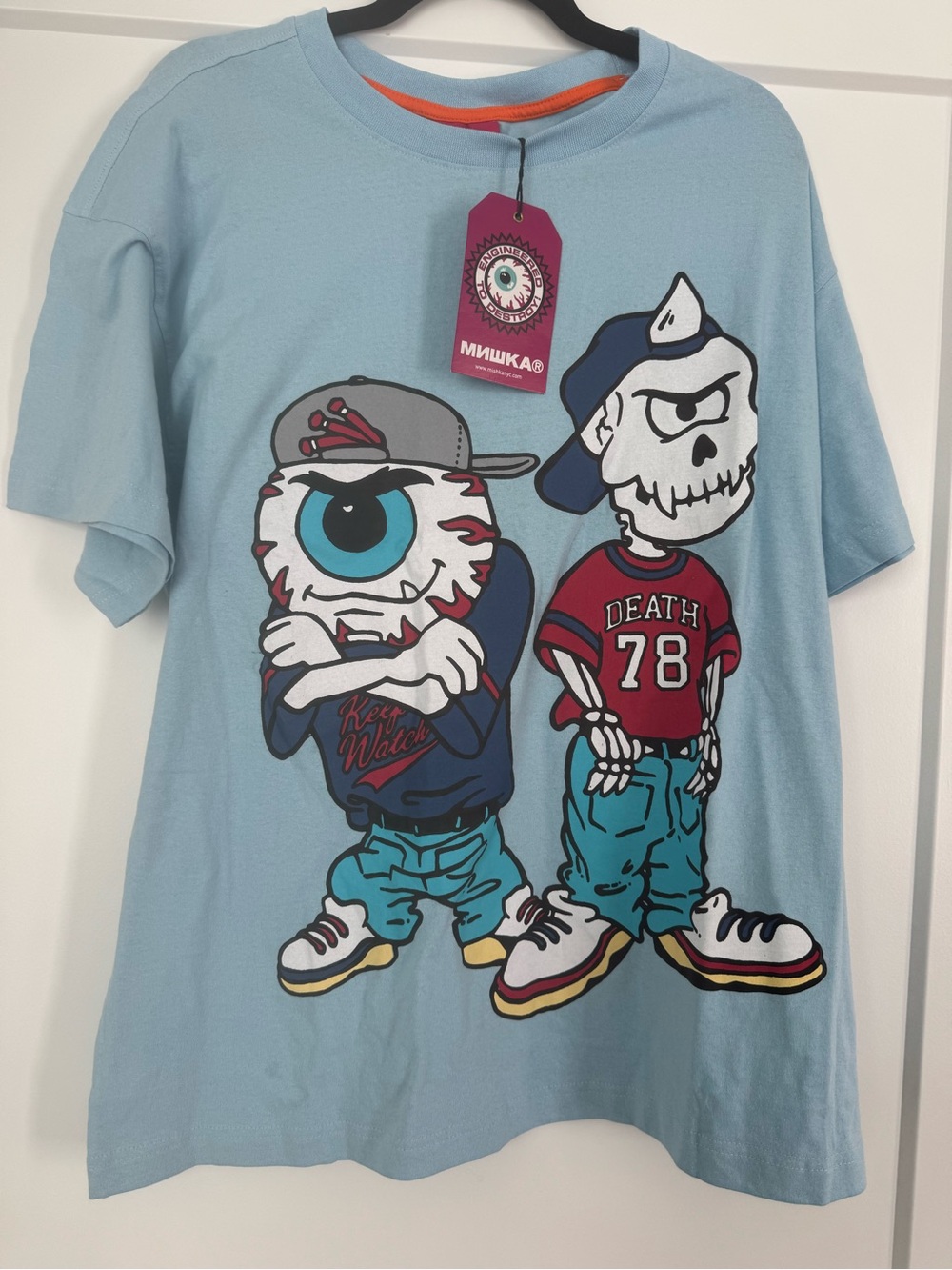 Mishka Light Blue Graphic Short Sleeve Tee with Eyeball & Skull